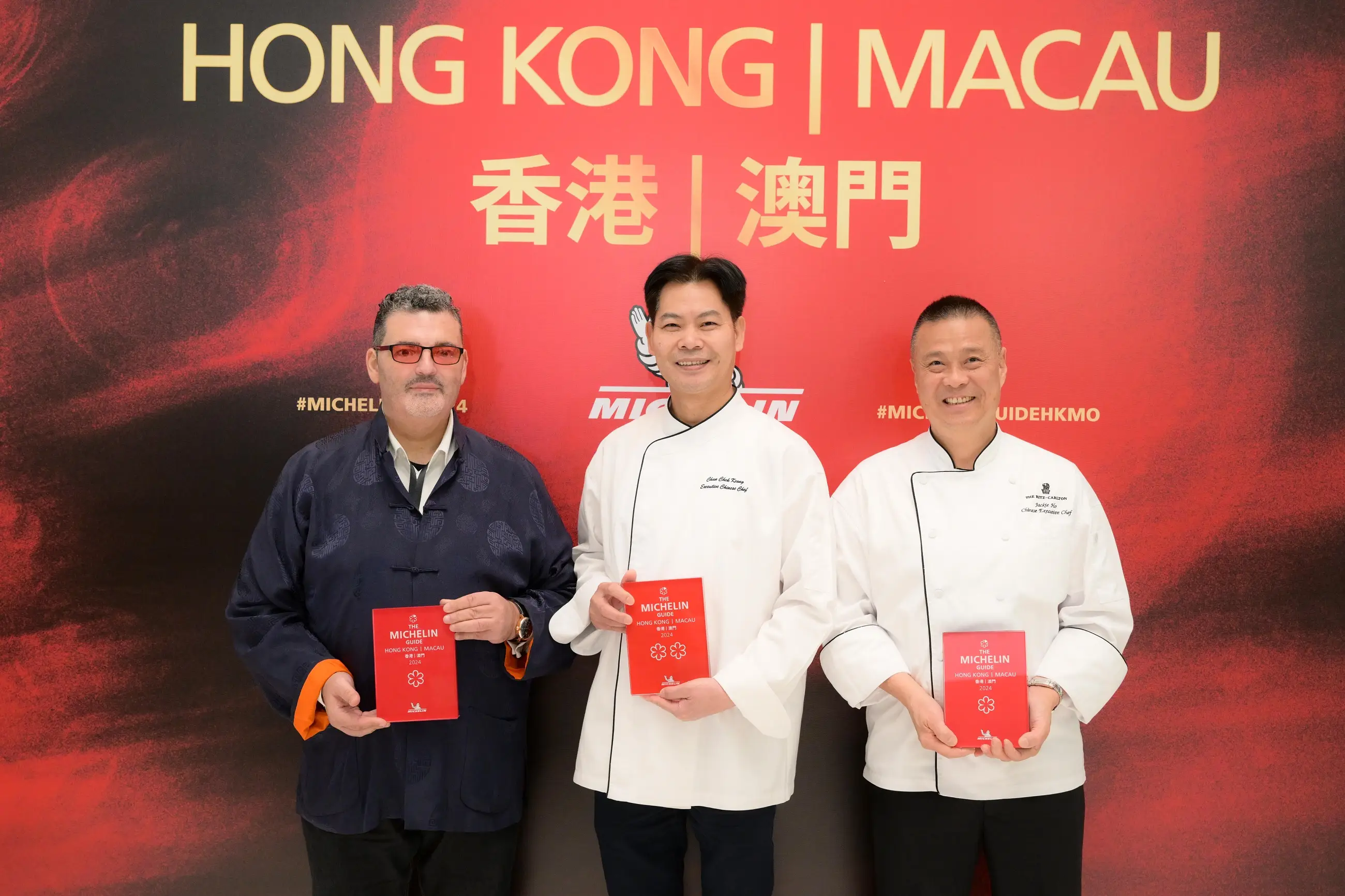 The three chefs pose for a photo together